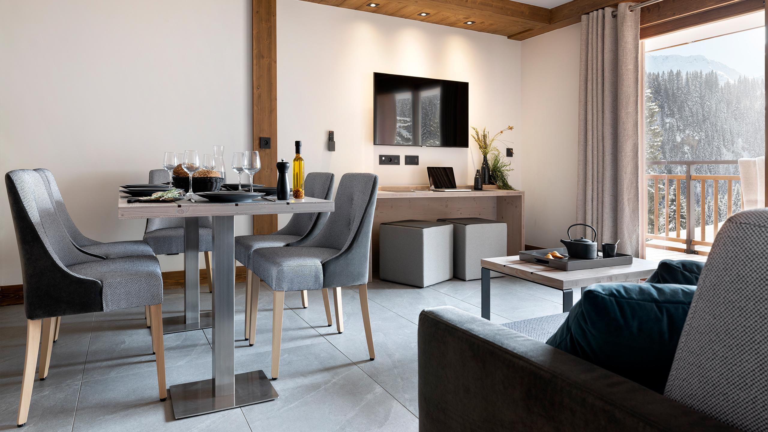 Salon d'un appartement disponible aux Chalets Láska situé aux Contamines-Montjoie